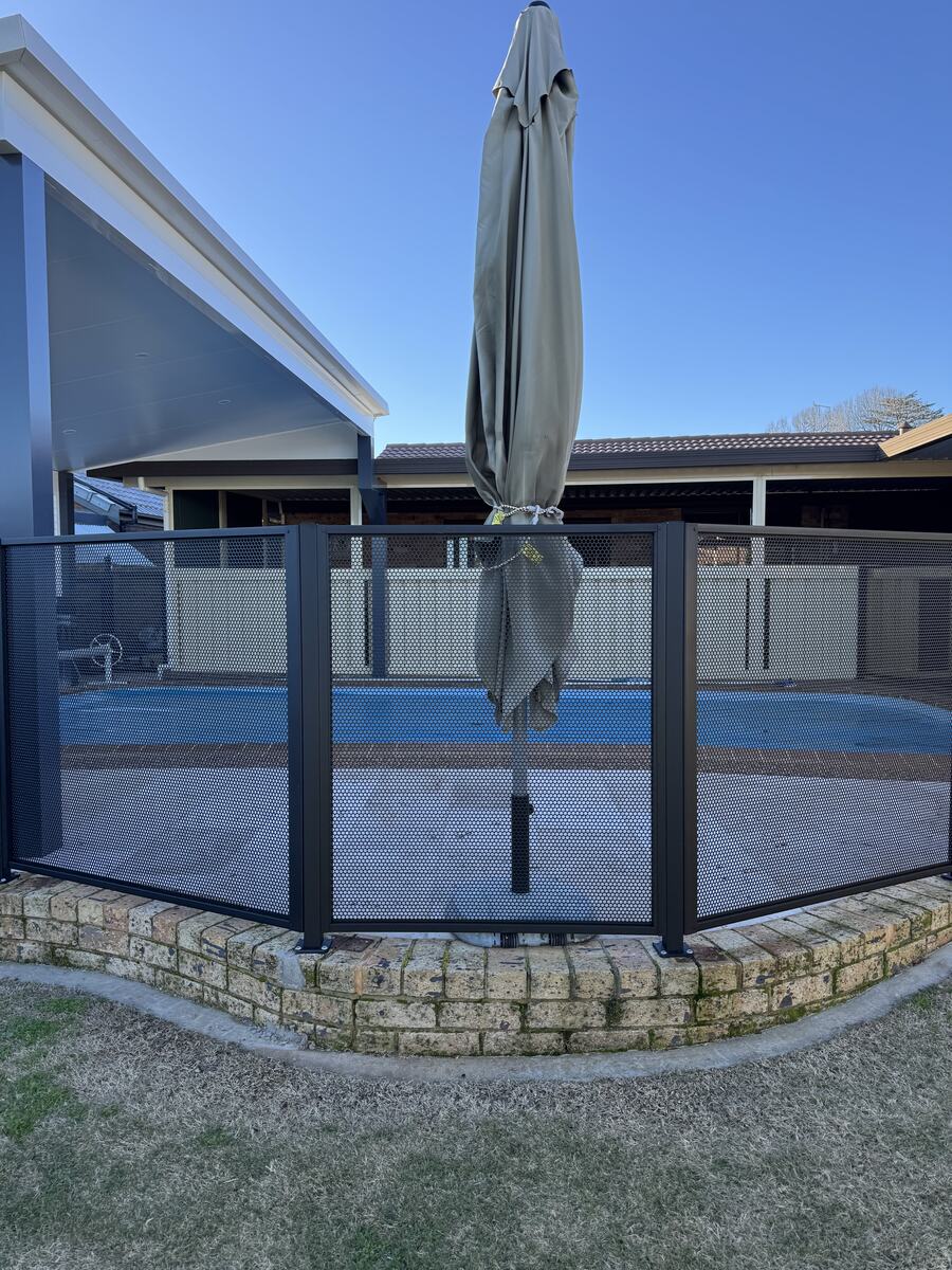 Pure Perf Textured Black pool fencing with garden umbrella, Sydney